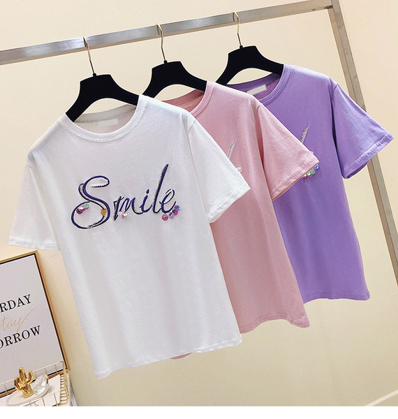 Moteriški pavasariniai marškinėliai su apvalia iškirpte ir spalvingais siuvinėjimais