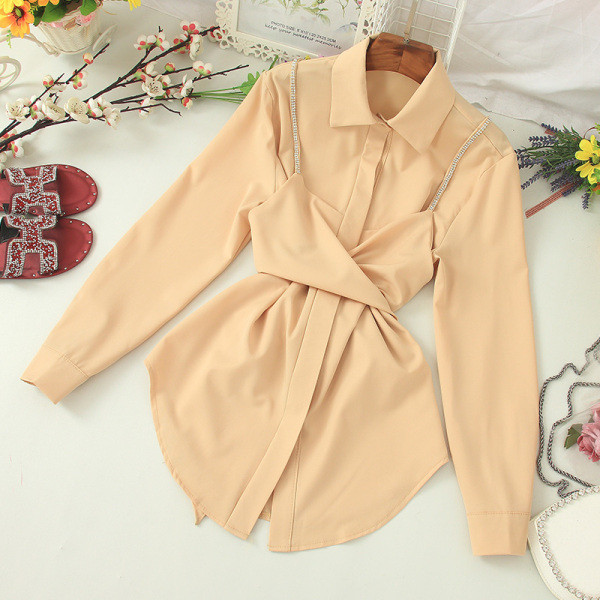 Stilīgs sieviešu krekls ar akmeņiem un garām piedurknēm - asimetrisks modelis