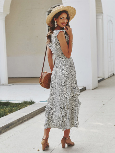 Jauna modeļa moderna sieviešu kleita ar ovālu kakla izgriezumu ar punktiem