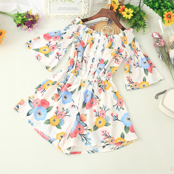 Sieviešu ikdienas kombinezons ar lotosa piedurknēm un atkailinātiem pleciem