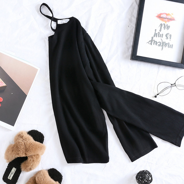 Sieviešu melna asimetriska blūze ar garām piedurknēm