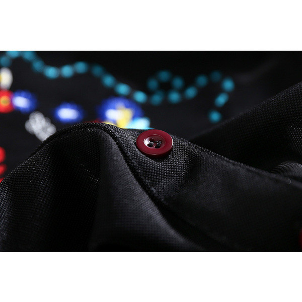 Sieviešu melns krekls ar platām piedurknēm un izšuvumiem