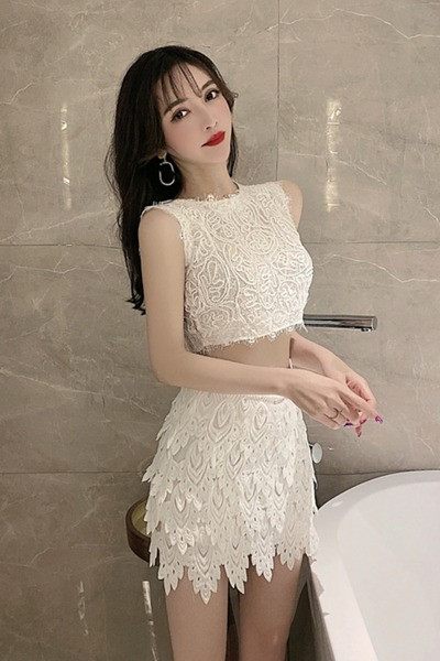 Jauna modeļa vasaras sieviešu komplekts ar īsu topu un īsiem svārkiem