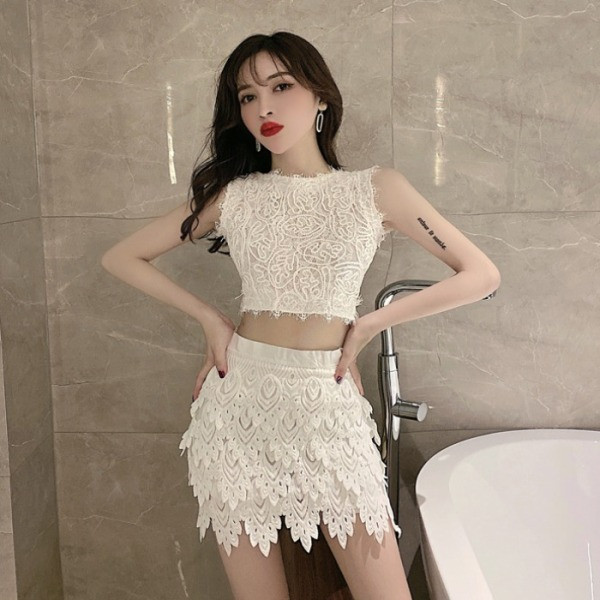 Jauna modeļa vasaras sieviešu komplekts ar īsu topu un īsiem svārkiem