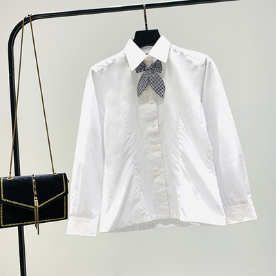 Modernūs moteriški marškiniai su klasikine apykakle ir kaspinu