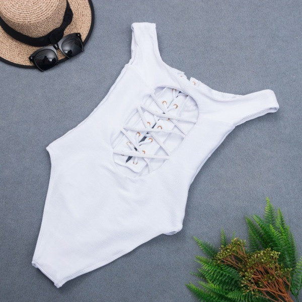 Γυναικείο ολόσωμο μαγιό σε λευκό χρώμα με διασταυρούμενους δεσμούς