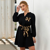 Nagy méretű női ruha hosszú ujjal és leopárd övvel