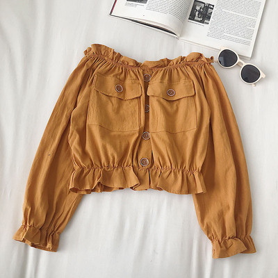 Μοντέρνα γυναικεία μπλούζα με τσέπες και ντεκολτέ