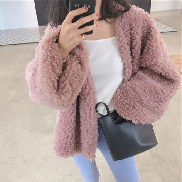 Γυναικείο χνουδωτό μπουφάν με μακριά μανίκια - φαρδύ μοντέλο