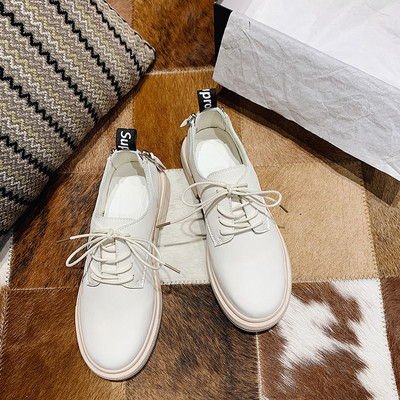 Καθημερινά γυναικεία παπούτσια από οικολογικό δέρμα με  κορδόνια και επιγραφή