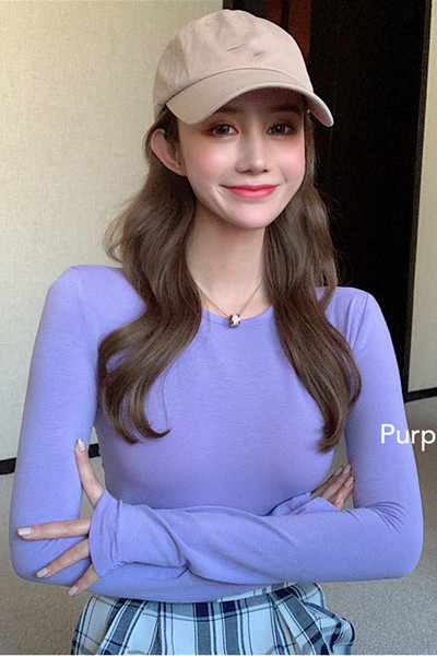 Naiste vabaaja pikkade varrukate ja ümara kaelusega pluus