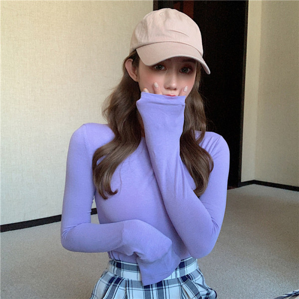 Naiste vabaaja pikkade varrukate ja ümara kaelusega pluus