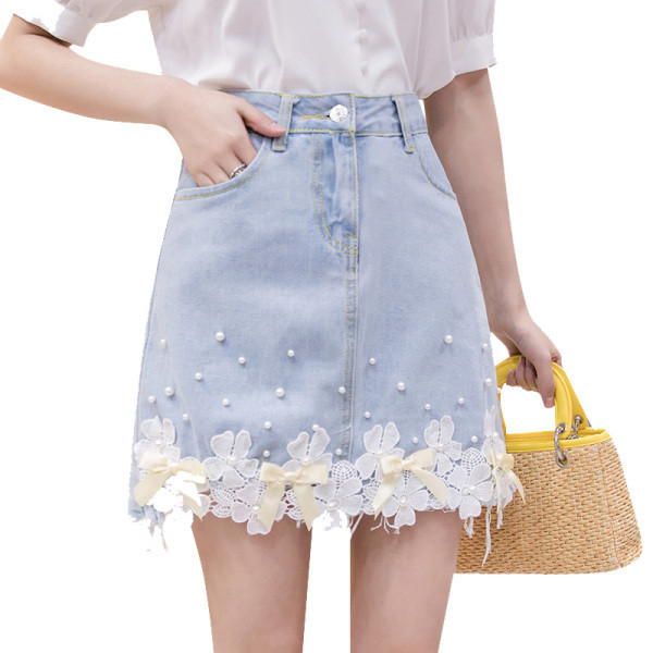 Moderni sieviešu džinsa svārki ar pērlēm un lentītēm