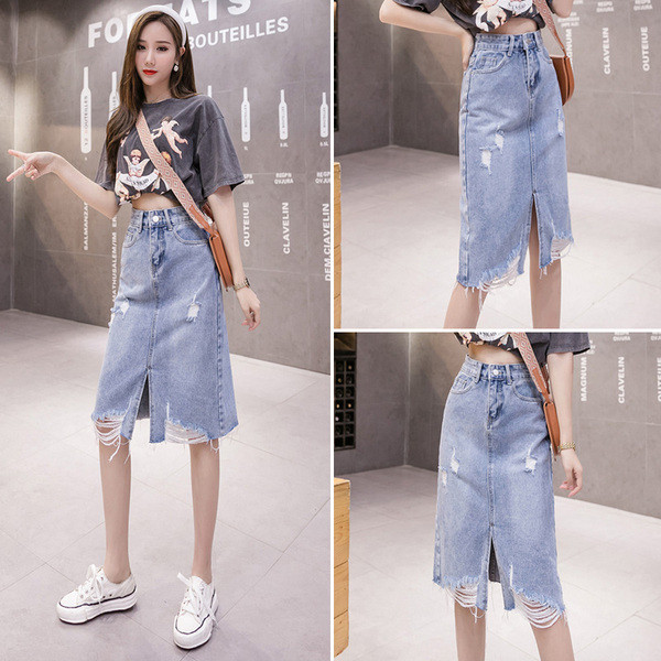 Naiste kõrge vöökoha, lõhiku ja rebenenud motiividega teksaseelik