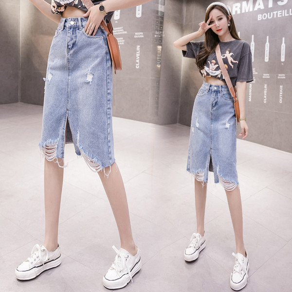 Naiste kõrge vöökoha, lõhiku ja rebenenud motiividega teksaseelik