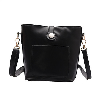 Κομψή γυναικελια τσάντα με μπροστινή τσέπη οικολογικό δέρμα