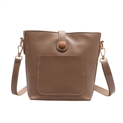 Κομψή γυναικελια τσάντα με μπροστινή τσέπη οικολογικό δέρμα