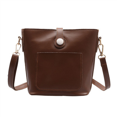 Κομψή γυναικελια τσάντα με μπροστινή τσέπη οικολογικό δέρμα