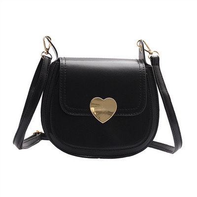 Κομψή γυναικεία τσάντα από οικολογικό δέρμα με μεταλλικό κουμπιά και μεγάλη λαβή