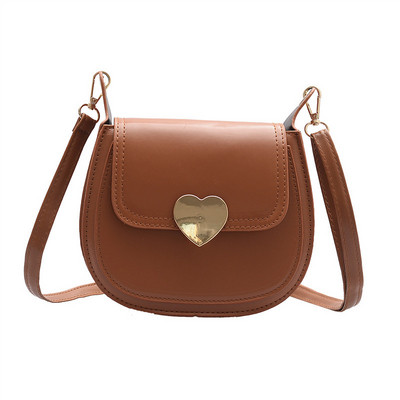 Κομψή γυναικεία τσάντα από οικολογικό δέρμα με μεταλλικό κουμπιά και μεγάλη λαβή