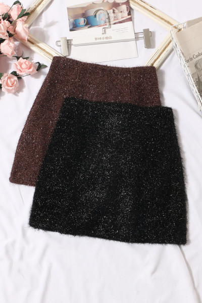 Pašreizējie sieviešu īsie svārki ar rāvējslēdzēju un augstu vidukli