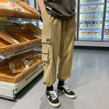 Мъжки спортен панталон с джобове и връзки