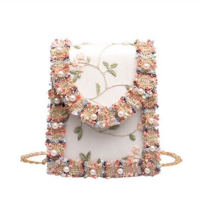 Stilinga rankinė su perlais ir siuvinėjimais