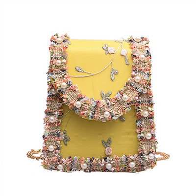 Stilinga rankinė su perlais ir siuvinėjimais