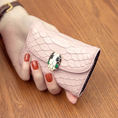 Μοντέρνο μικρό γυναικείο πορτοφόλι από οικολογικό δέρμα με μεταλλική στερέωση