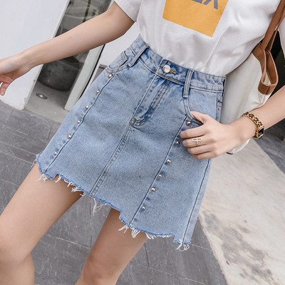 Moteriškas sijonas su metalinėmis akutėmis ir suplėšytais motyvais