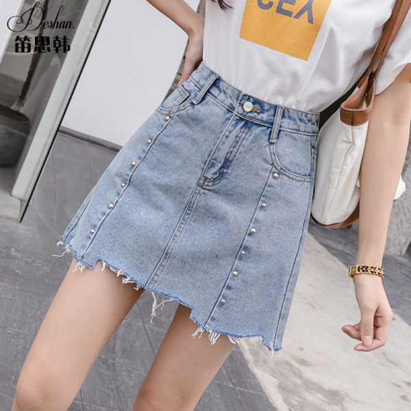 Moteriškas sijonas su metalinėmis akutėmis ir suplėšytais motyvais