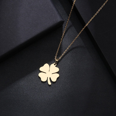 Women`s stainless steel necklace with a four-leaf clover pendant