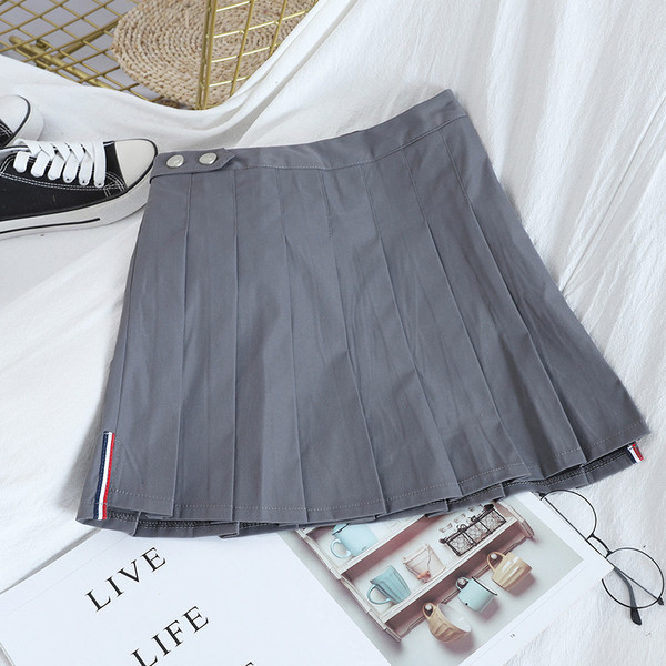 Moderni sieviešu kroku svārki ar augstu vidukli un pogām