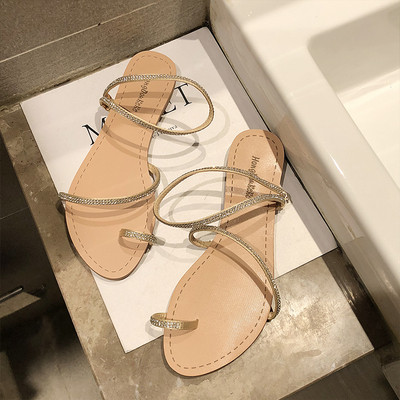 Γυναικεία μοντέρνα σανδάλια με λουράκια και  διακόσμητικές πέτρες - επίπεδη σόλα