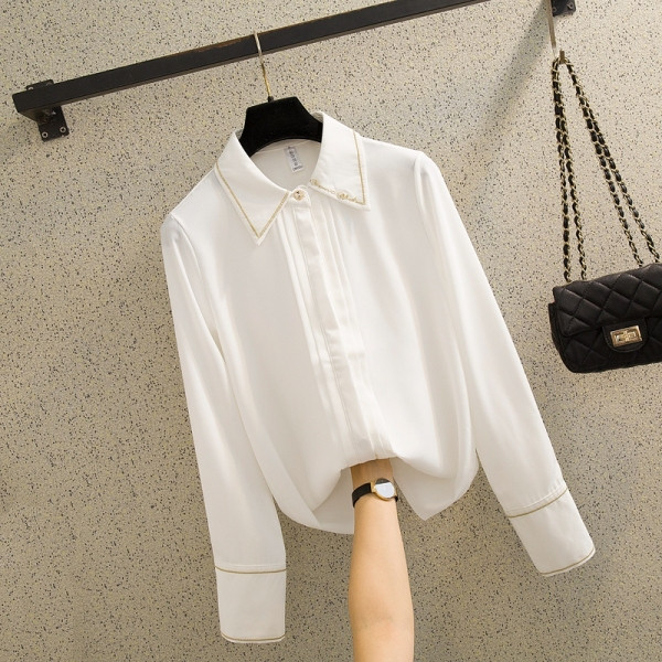 Stilīgs sieviešu krekls ar izšuvumu un klasisku apkakli