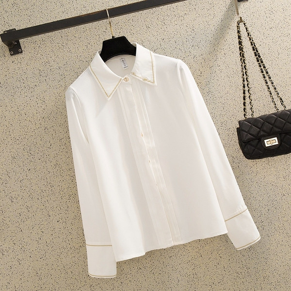 Stilīgs sieviešu krekls ar izšuvumu un klasisku apkakli