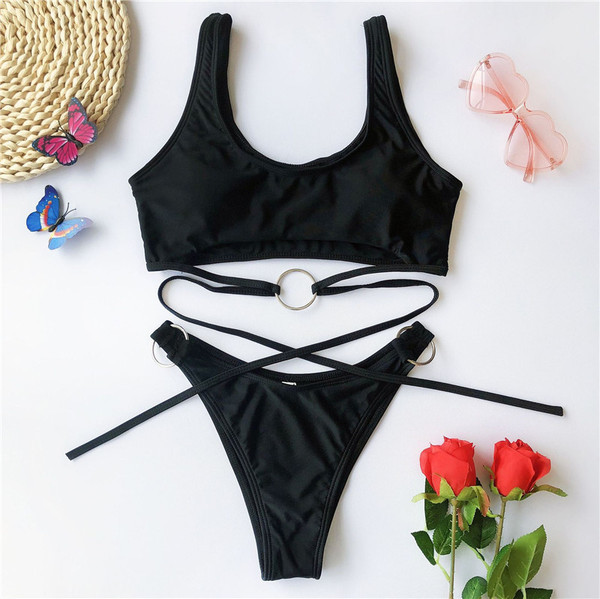 JAUNUMS Divdaļīgs sieviešu peldkostīms ar krusteniskām saitēm - leoparda raksts vai vienkrāsains modelis