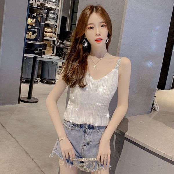 Modern női felső vékony pántokkal és fényes részecskékkel