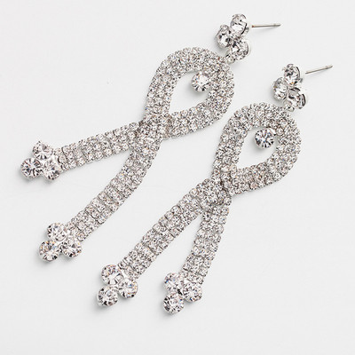 Eleganti sieviešu karājas auskari ar akmeņiem