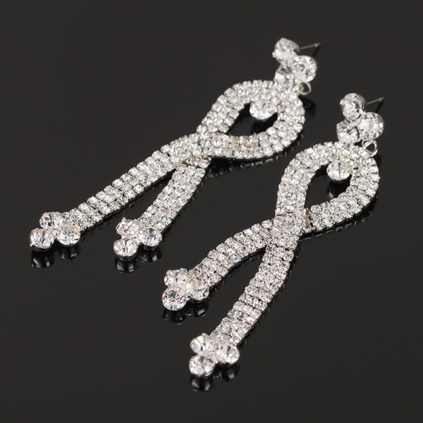 Eleganti sieviešu karājas auskari ar akmeņiem