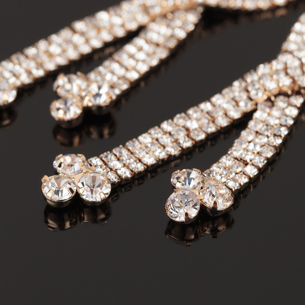 Eleganti sieviešu karājas auskari ar akmeņiem