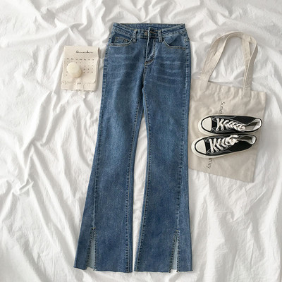 Modern női farmer, magas derékig érő modellel