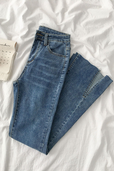 Modern női farmer, magas derékig érő modellel