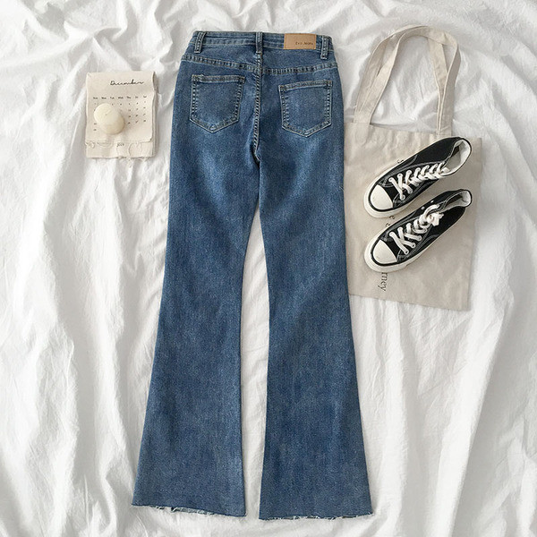 Modern női farmer, magas derékig érő modellel