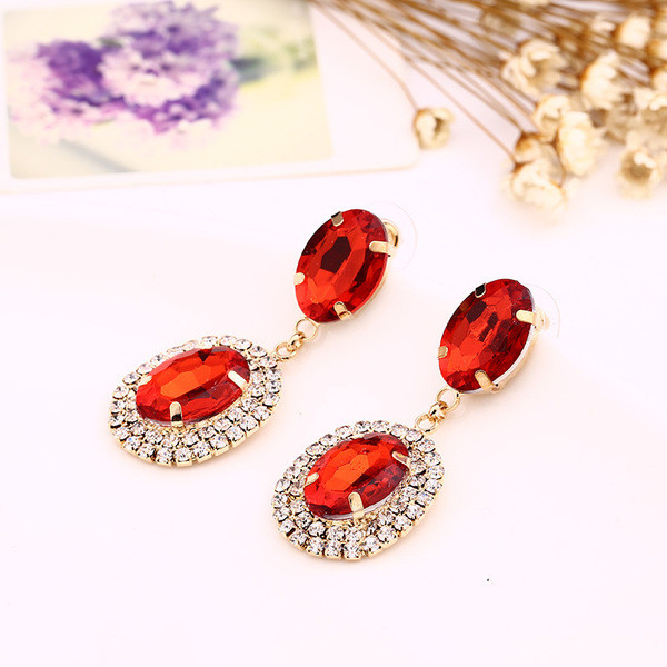 Eleganti sieviešu karājas auskari ar sudraba un sarkaniem akmeņiem