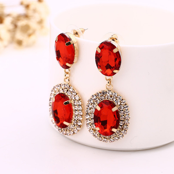 Eleganti sieviešu karājas auskari ar sudraba un sarkaniem akmeņiem