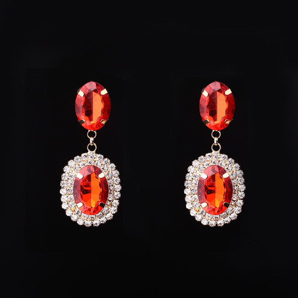 Eleganti sieviešu karājas auskari ar sudraba un sarkaniem akmeņiem