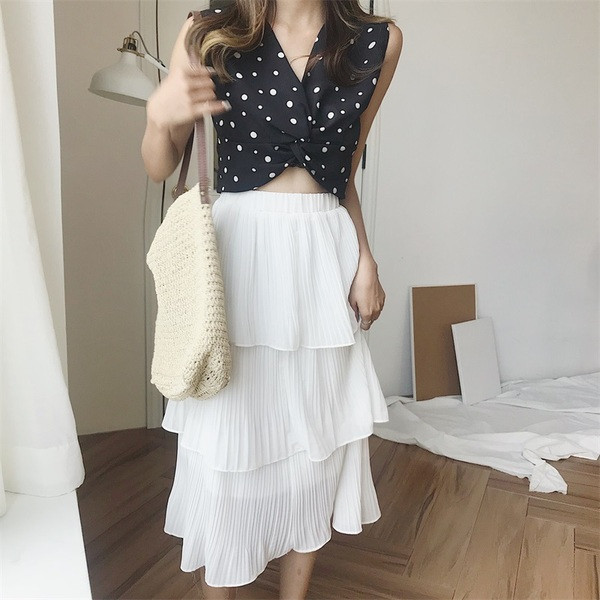 Laisvas moteriškas vidutinio ilgio sijonas