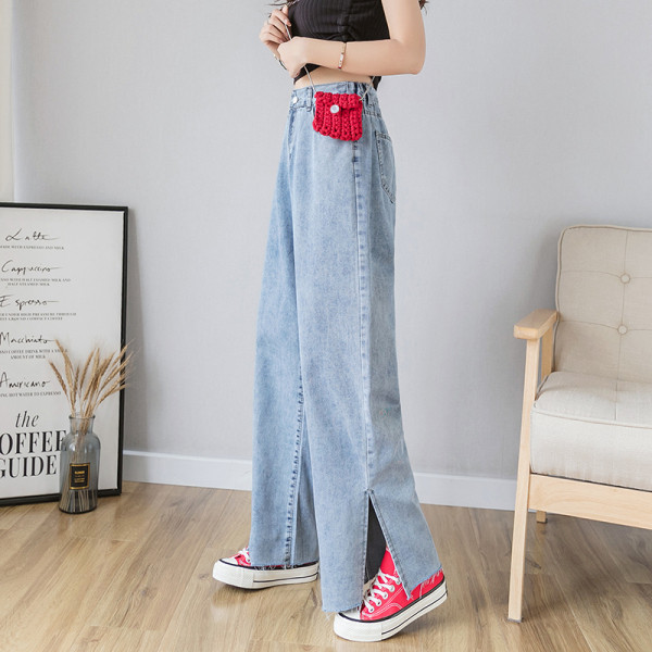 Mūsdienīgi sieviešu džinsi ar augstu vidukli un šķēlumu - plats modelis