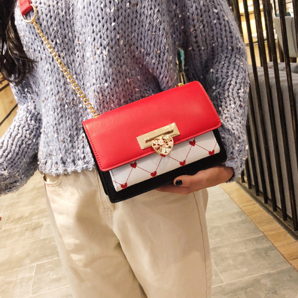 Geanta de dama moderna din piele ecologica cu maner lung si inimioare